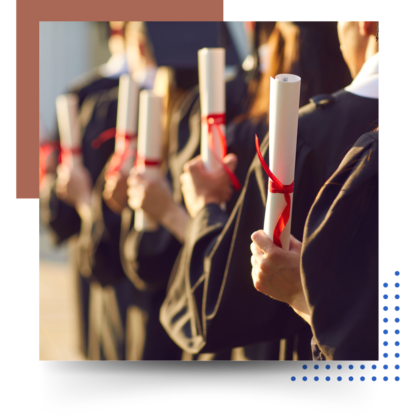 Graduates holding diplomas